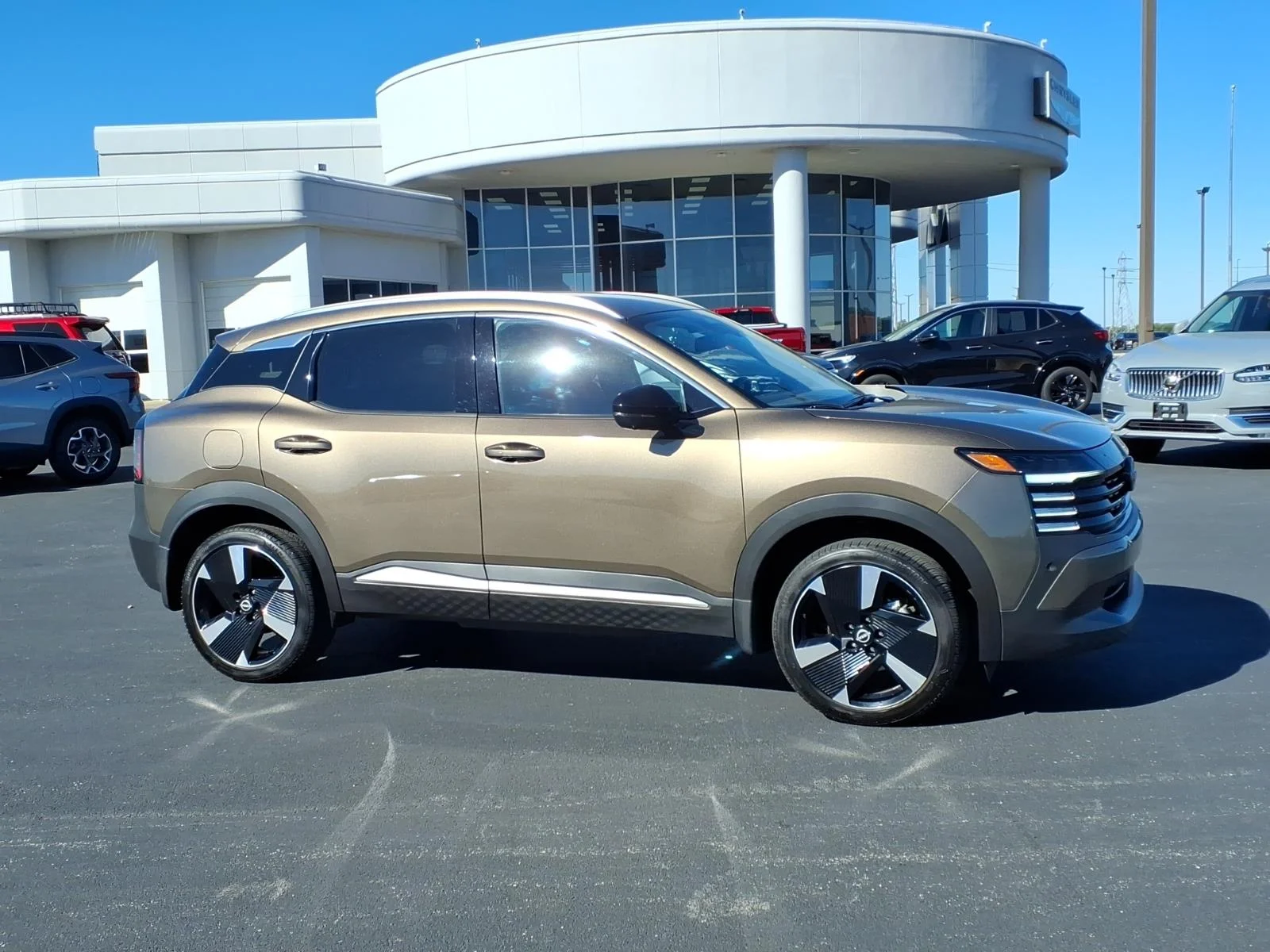 Used 2026 Canyon Bronze Metallic Nissan SR image 2