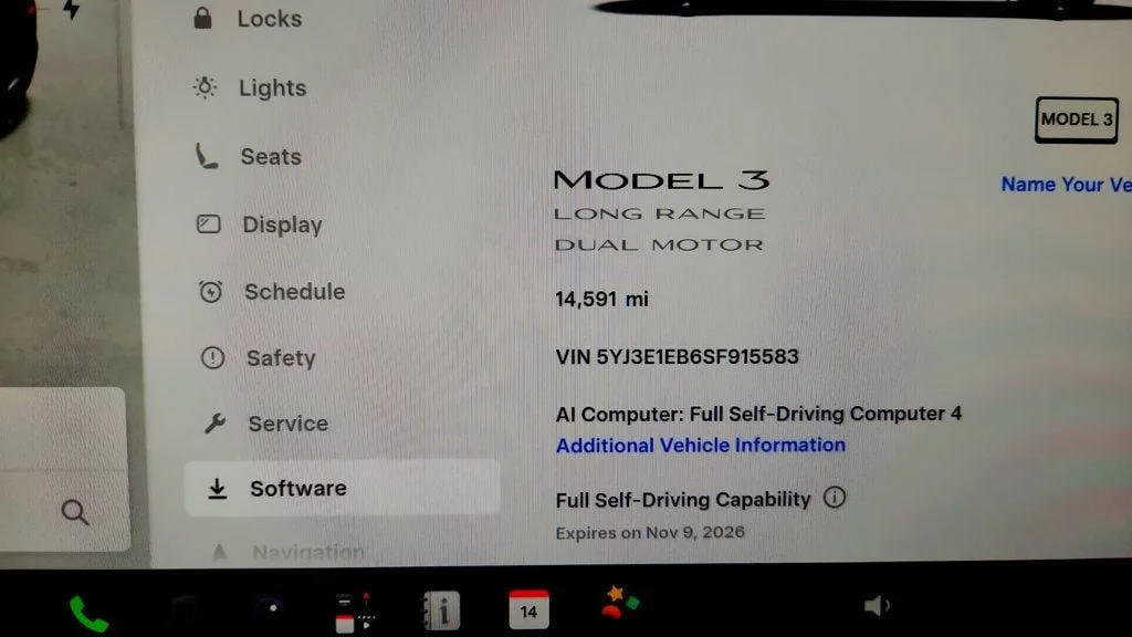 Used 2025 Stealth Grey Tesla Long Range AWD image 14