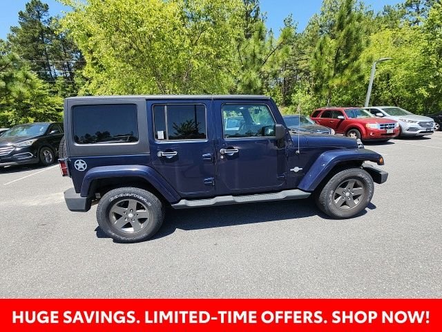 Used 2013 Blue Jeep Unlimited Sport image 18