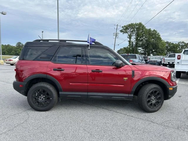 Used 2025 Ruby Red Metallic Tinted Clearcoat Ford Badlands image 2