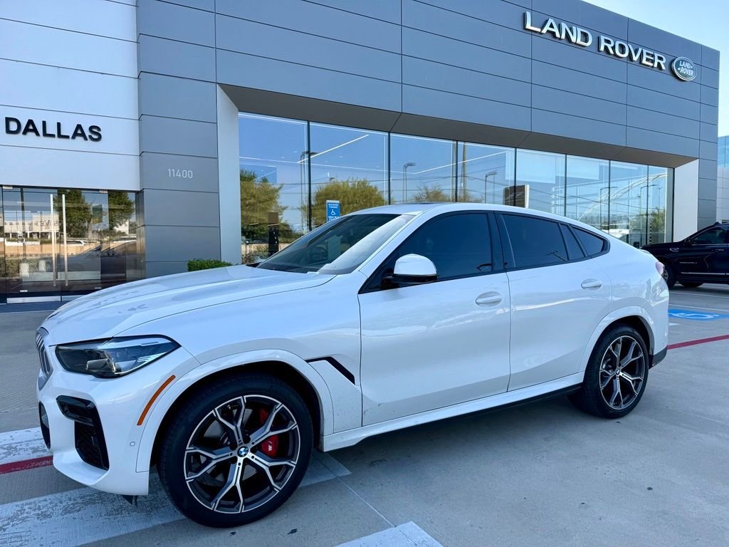 Used 2023 Mineral White Metallic BMW xDrive40i image 1