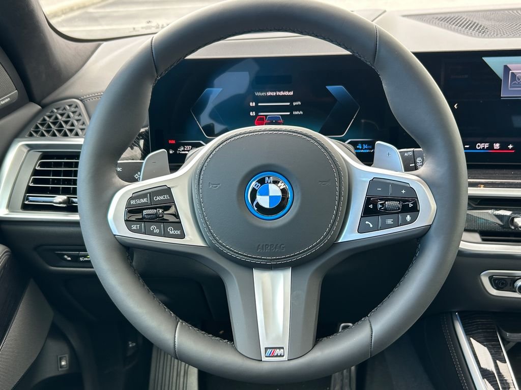 New 2026 Black Sapphire Metallic BMW xDrive50e image 18