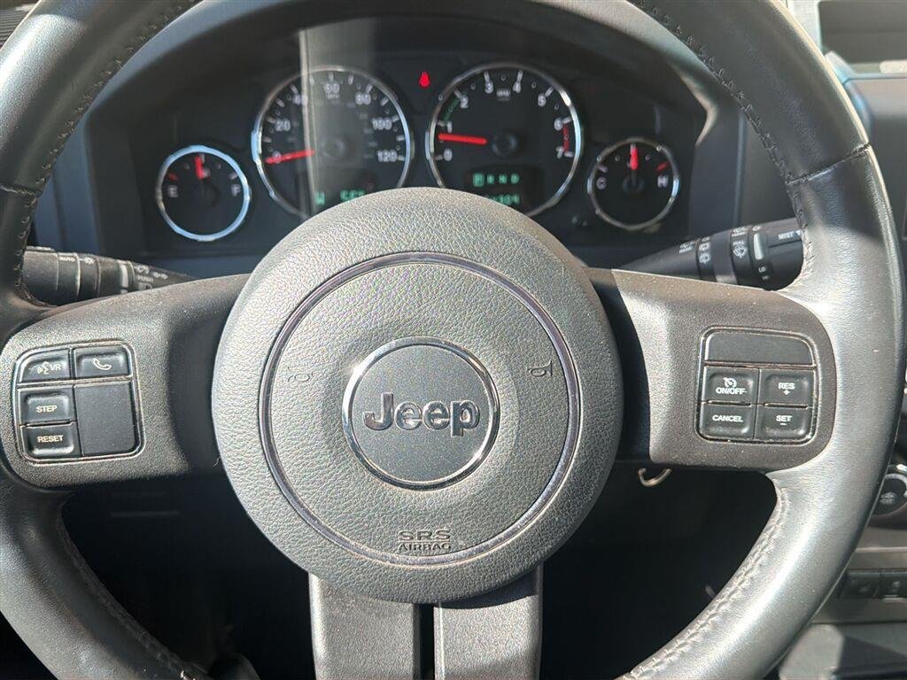 Used 2012 Brilliant Black Crystal Pearl Jeep Sport Latitude image 10