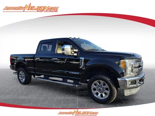Used 2017 Shadow Black Ford Lariat image 1