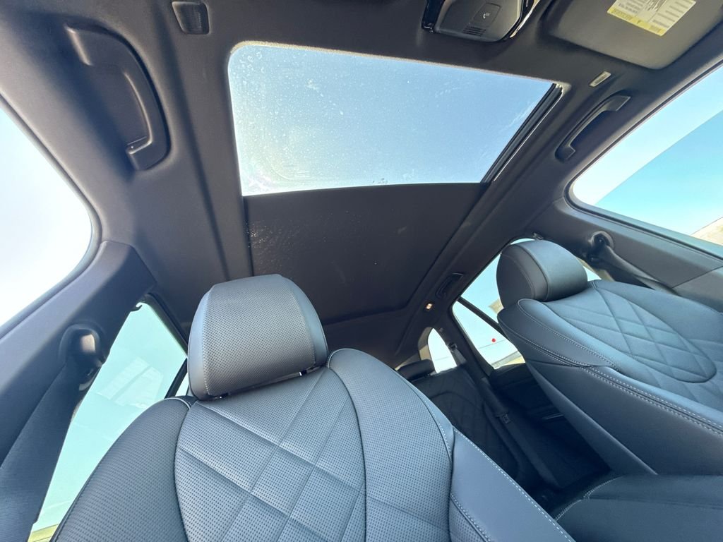 New 2026 Tanzanite Blue II Metallic BMW xDrive50e image 14