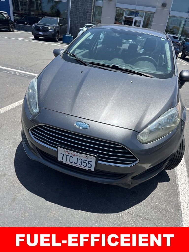 Used 2016 Gray Ford SE image 1