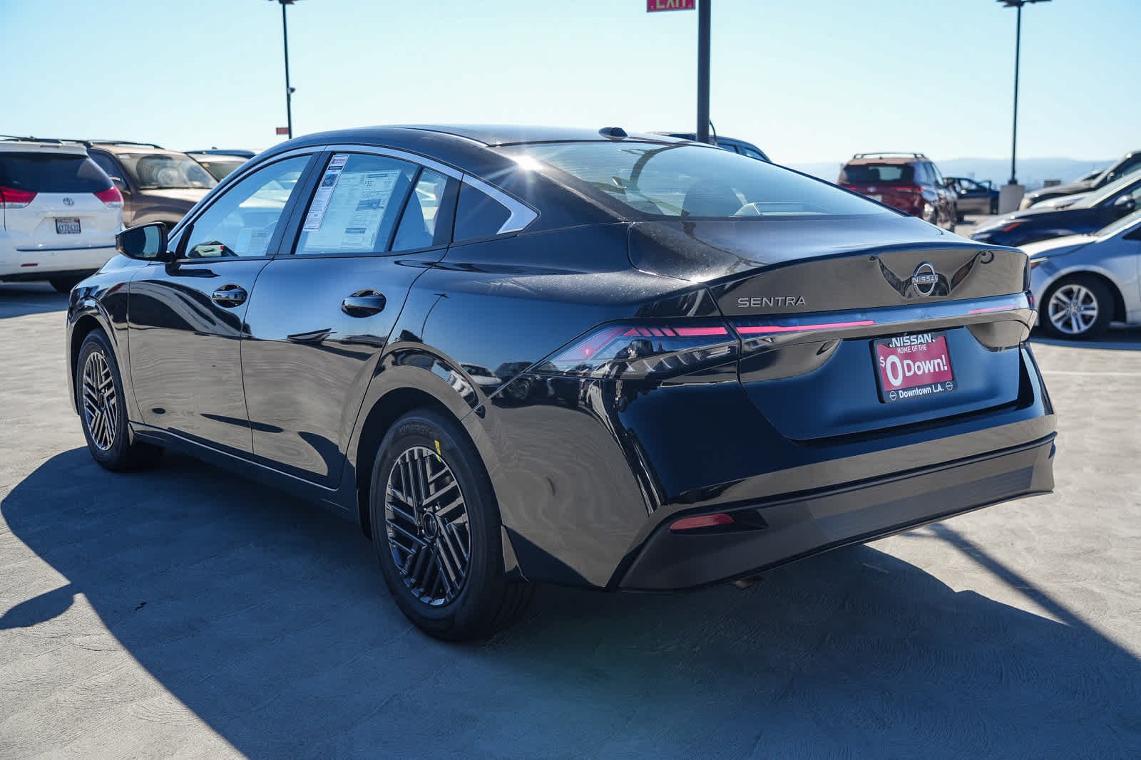 New 2026 Super Black Nissan SV image 8