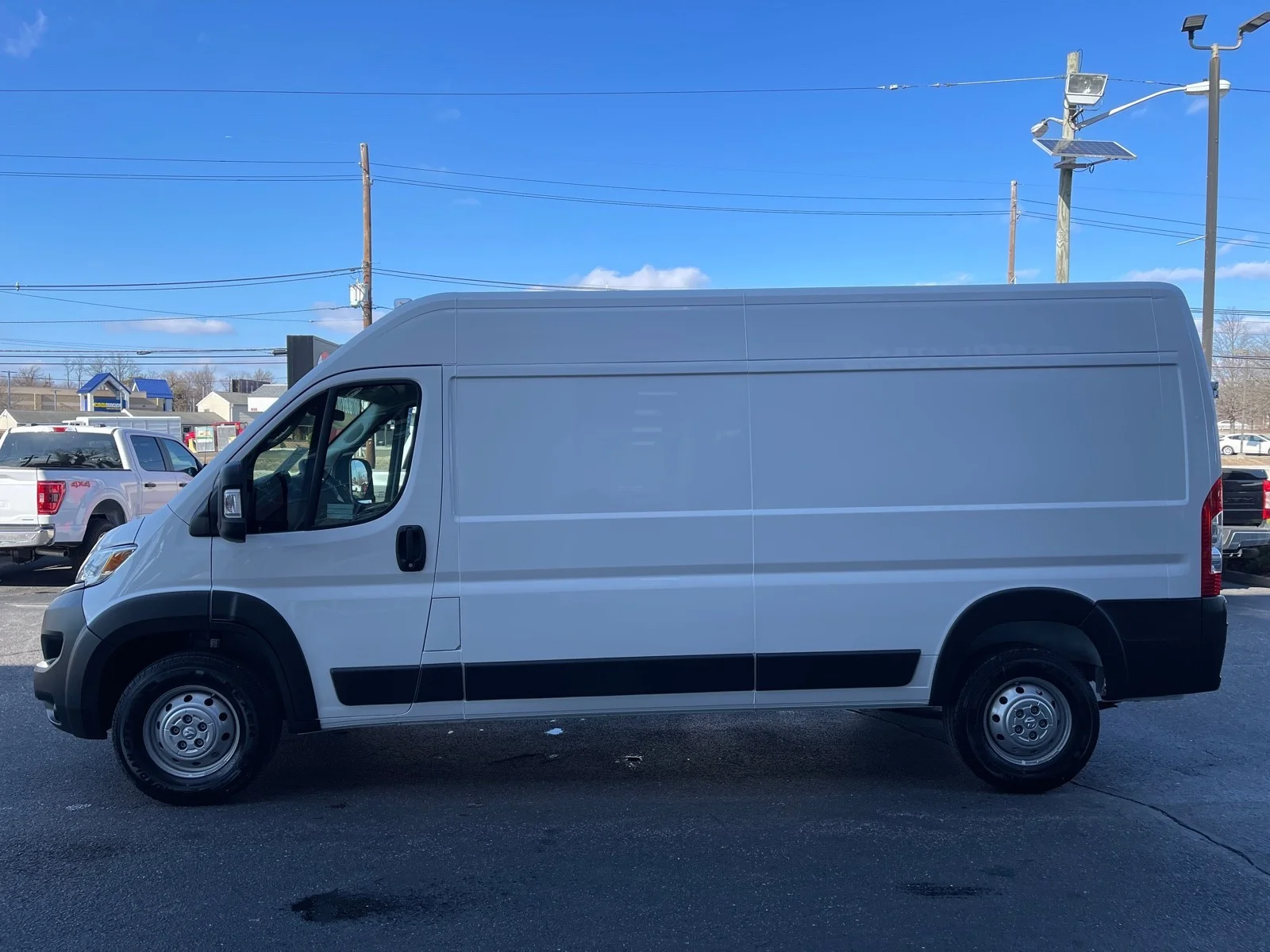 Used 2023 Bright White Clearcoat Ram High Roof image 4