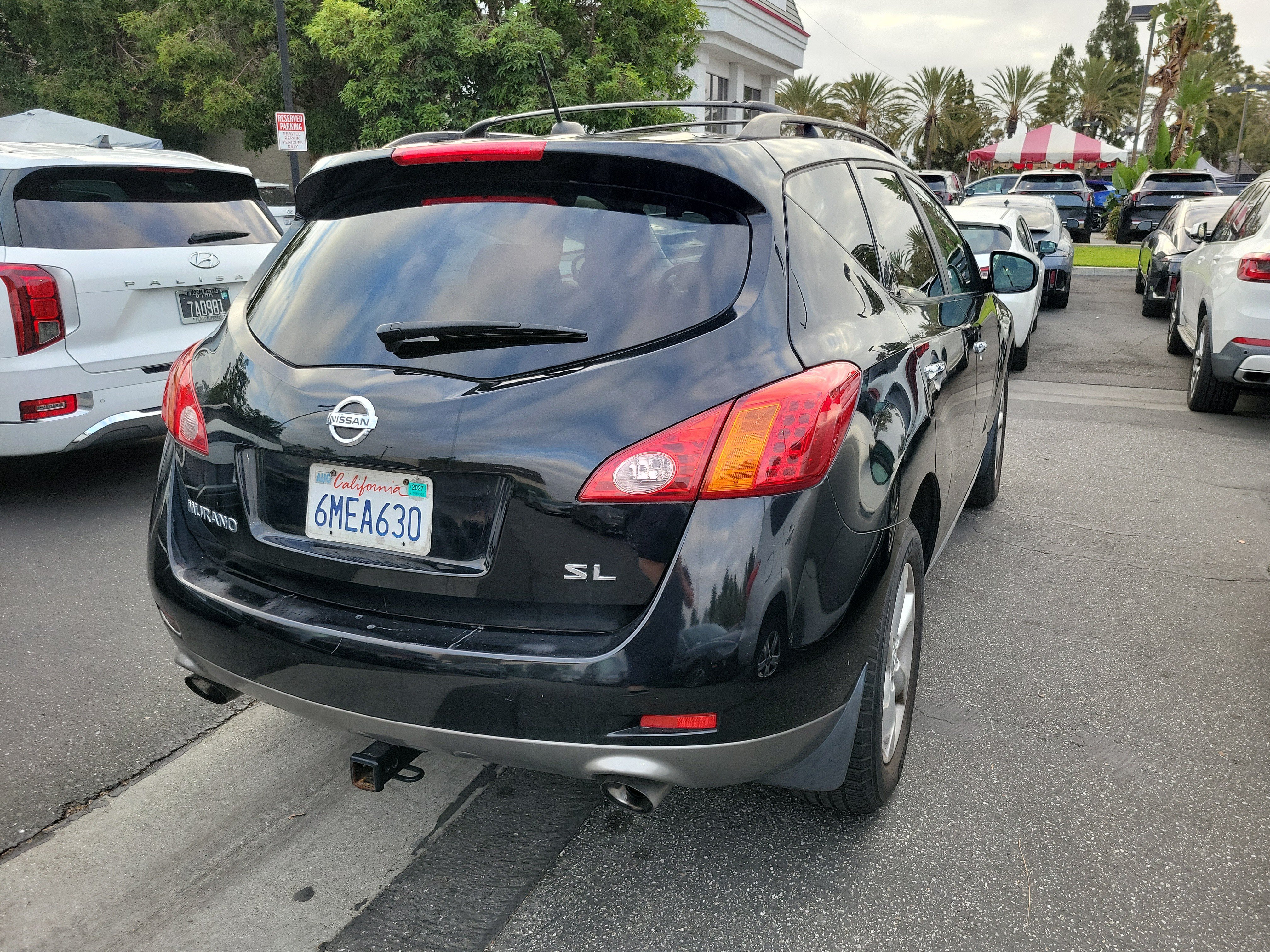 Used 2010 Super Black Nissan SL image 5