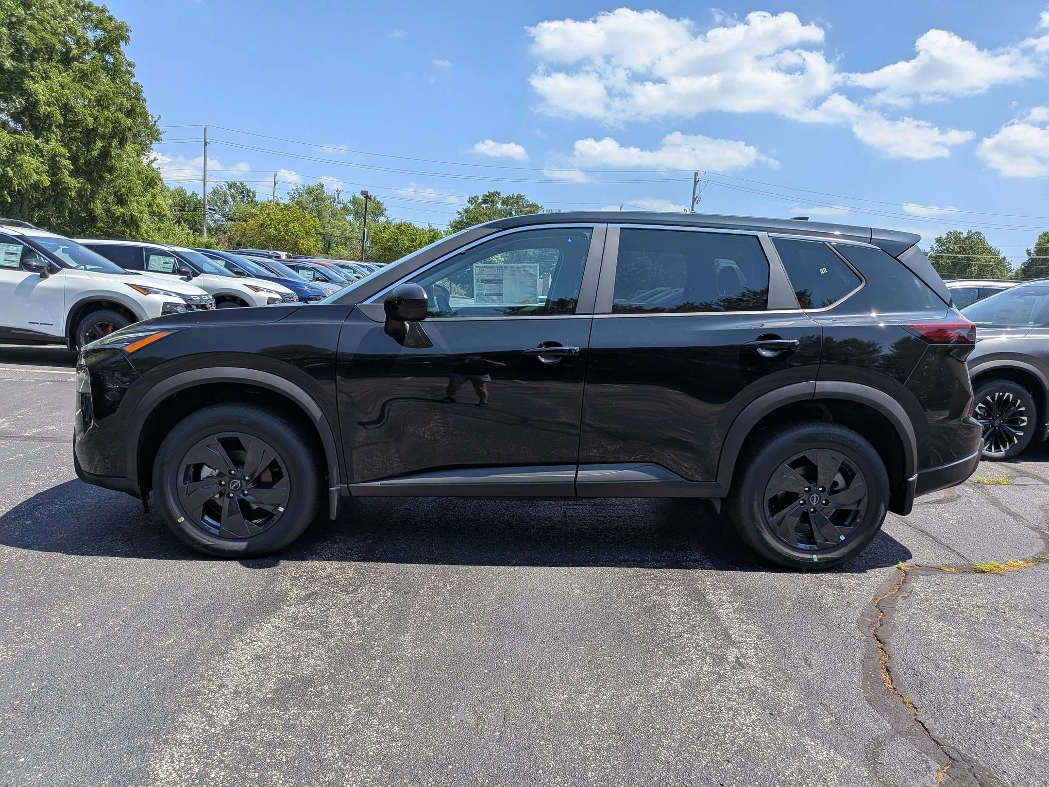 New 2026 Super Black Nissan SV image 8