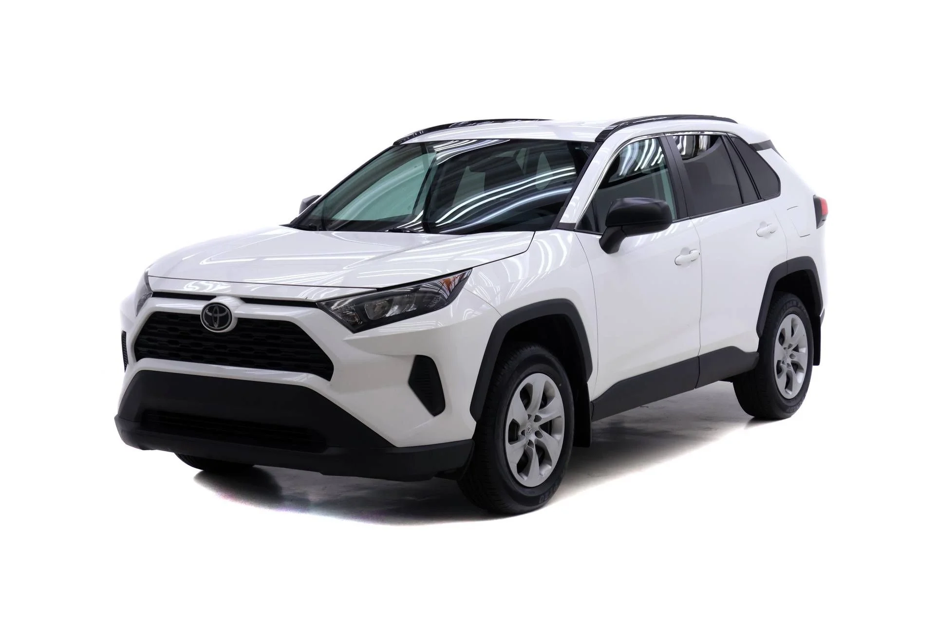Used 2021 Super White Toyota LE image 1