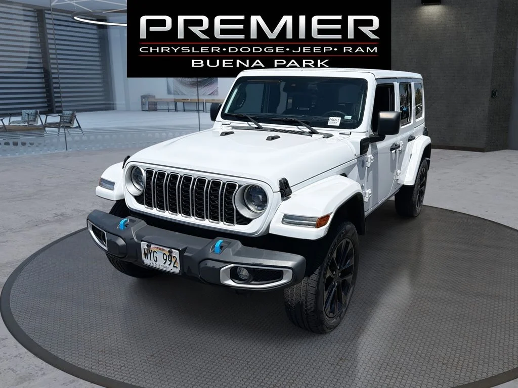 Used 2024 White Jeep Sahara 4xe image 1