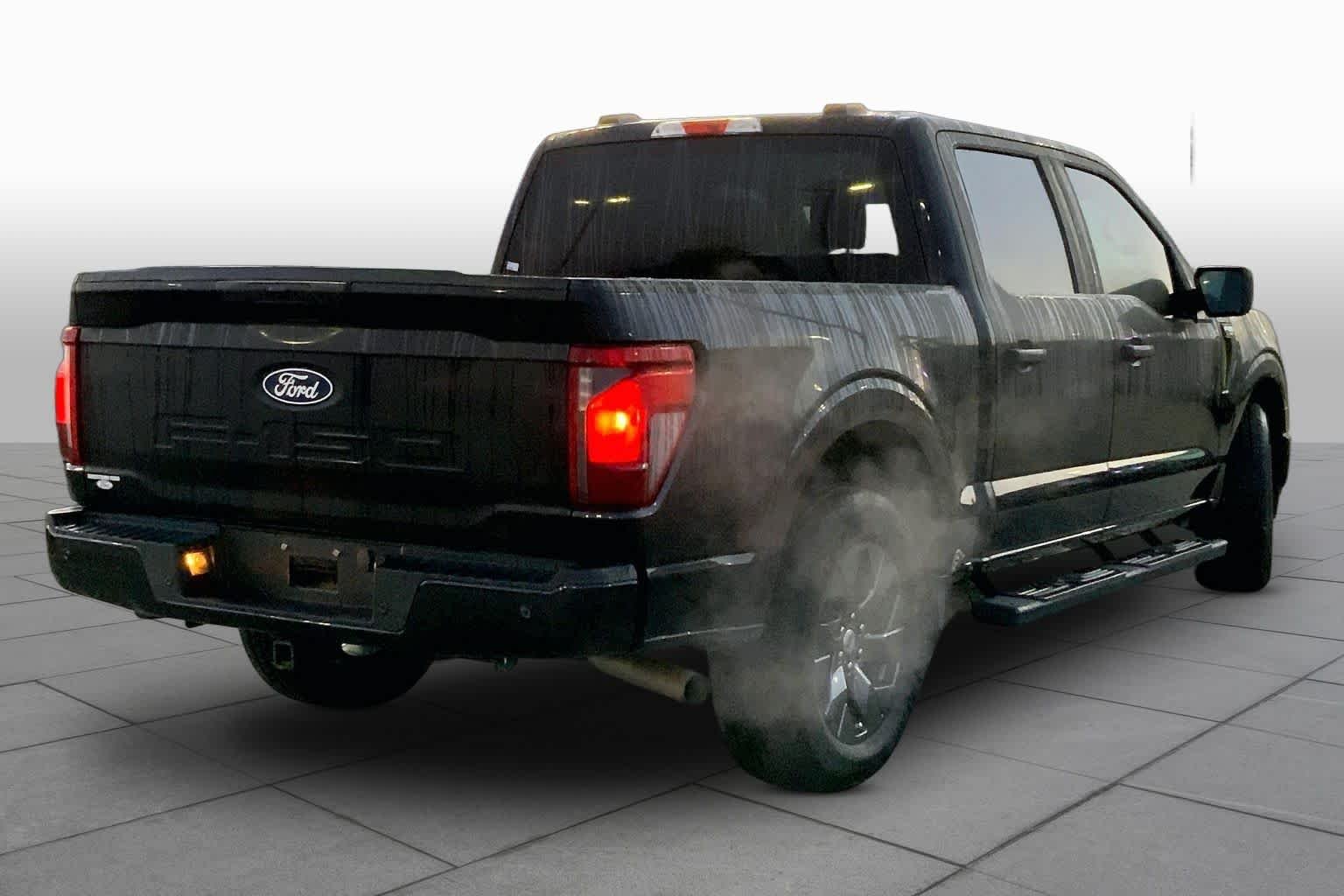 Used 2025 Agate Black Metallic Ford STX image 12