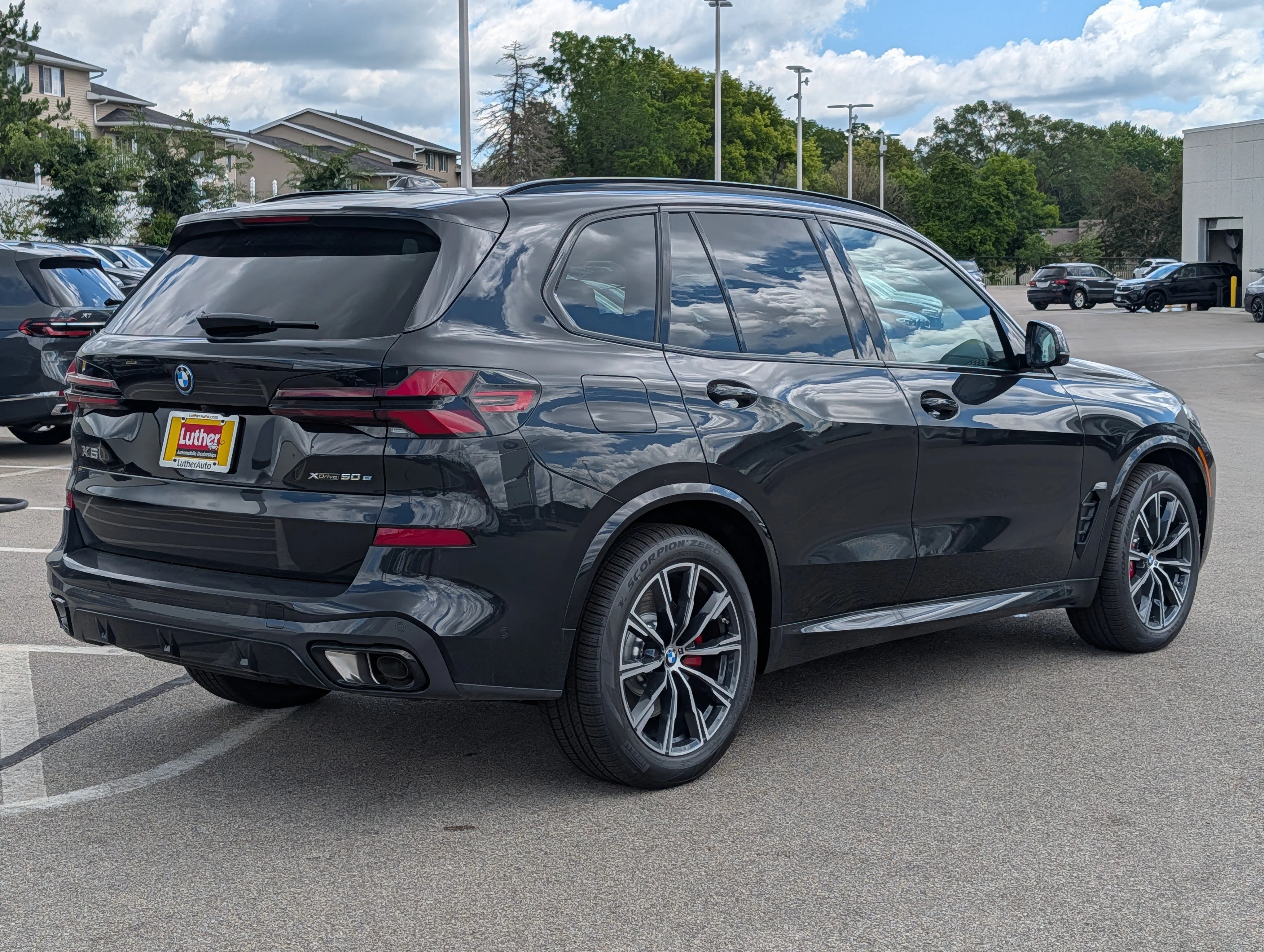 New 2026 Black Sapphire Metallic BMW xDrive50e image 2