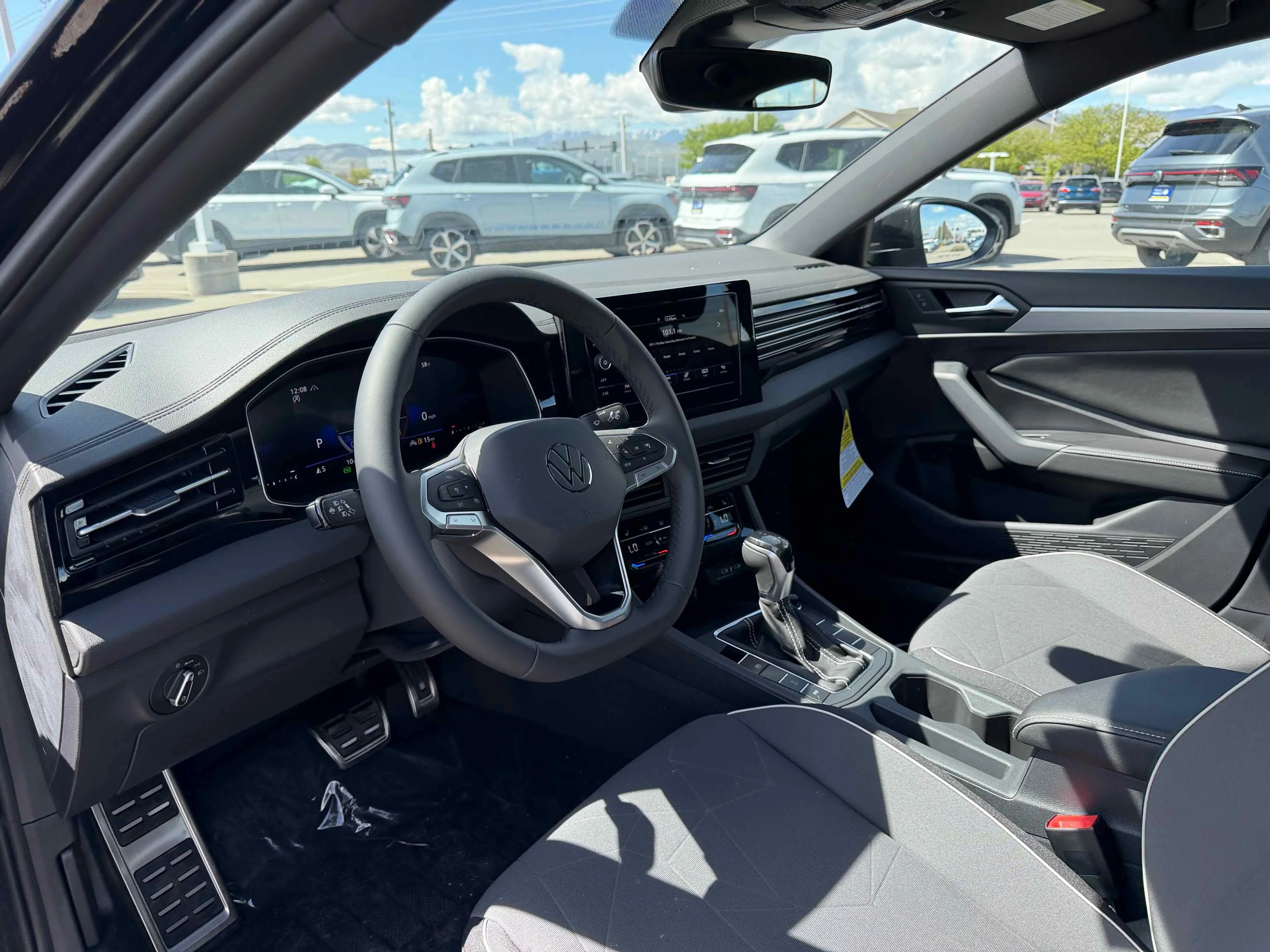 New 2026 Deep Black Volkswagen Sport image 4