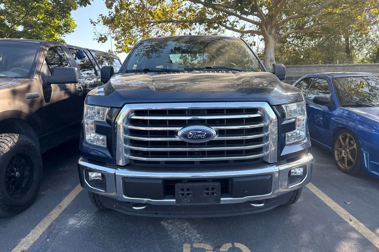 Used 2015 Blue Jeans Metallic Ford XLT image 2