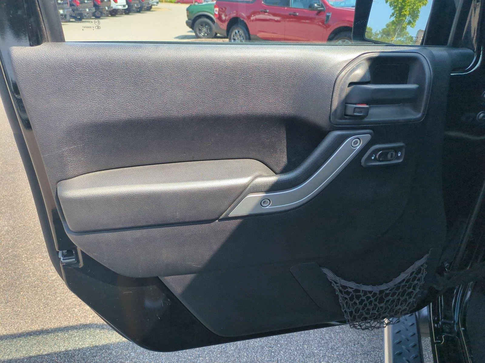 Used 2012 Black Jeep Sahara image 14