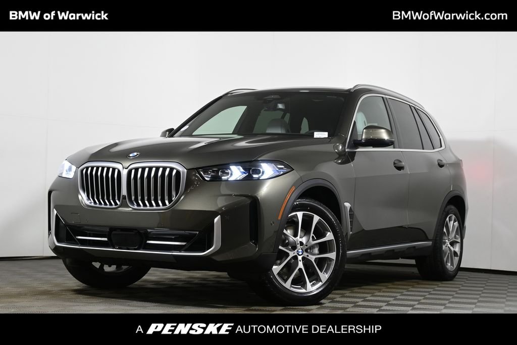 Used 2026 Green Metallic BMW xDrive40i image 1