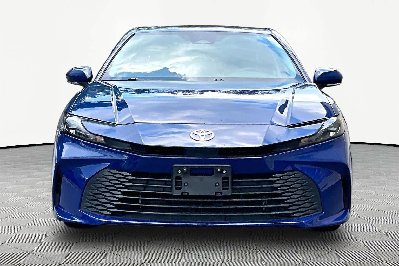 Used 2025 Reservoir Blue Toyota LE image 4