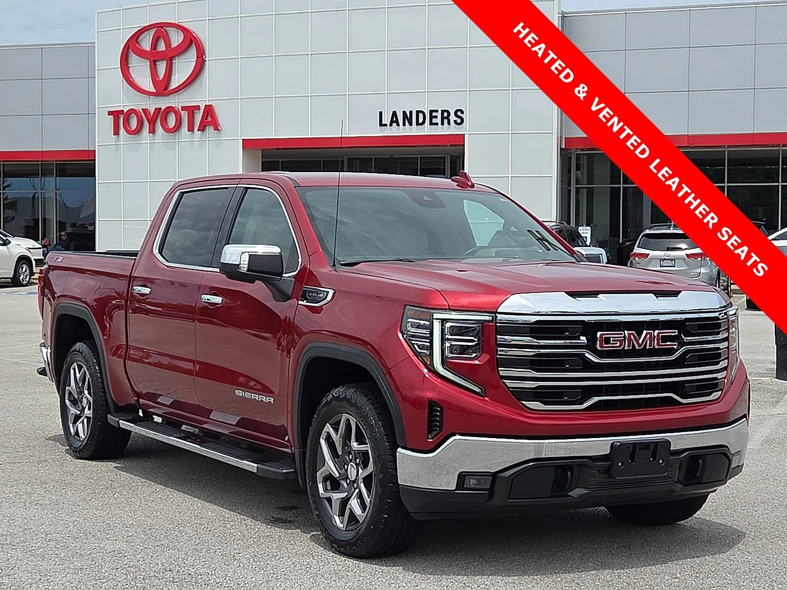 Used 2023 Volcanic Red Tintcoat GMC SLT image 1
