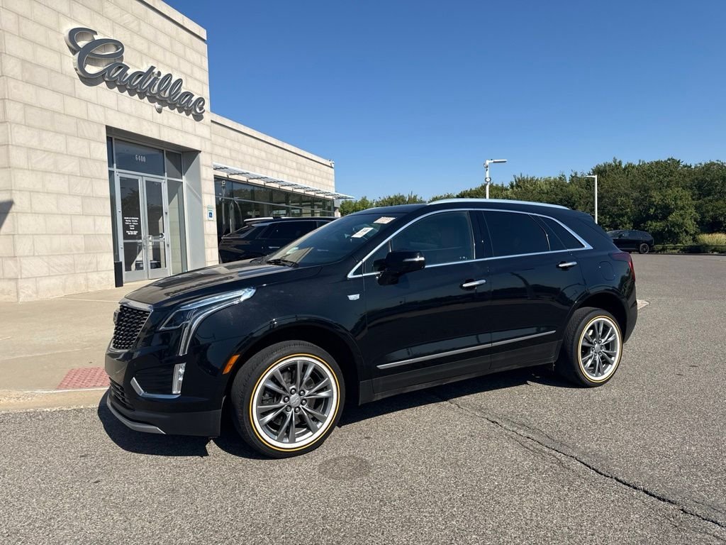 Used 2021 Black Cadillac Premium Luxury image 1