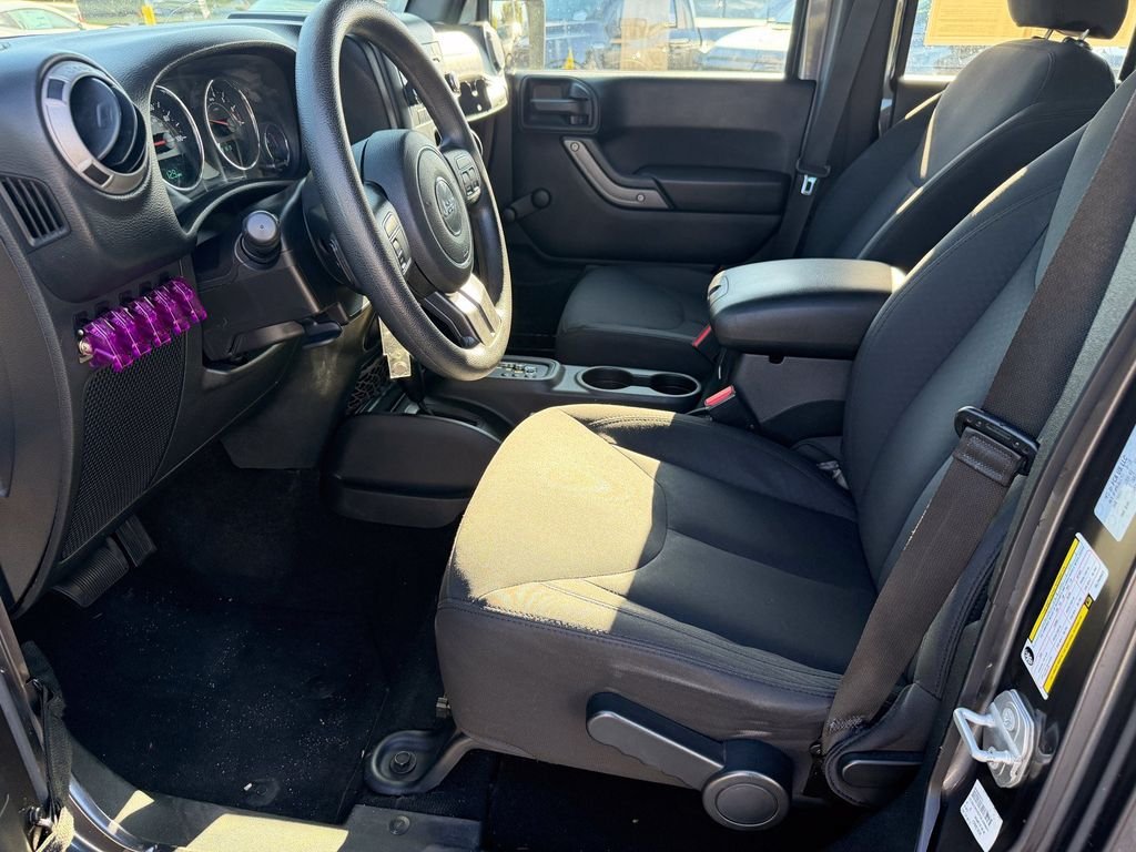 Used 2016 Granite Crystal Clearcoat Metallic Jeep Unlimited Sport image 26