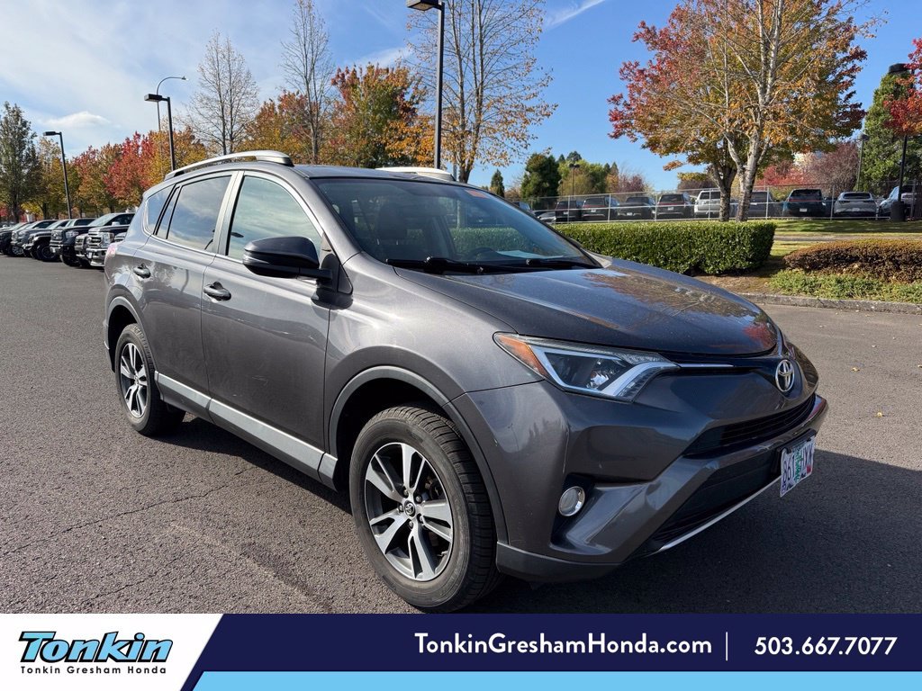Used 2016 Magnetic Gray Metallic Toyota XLE image 1