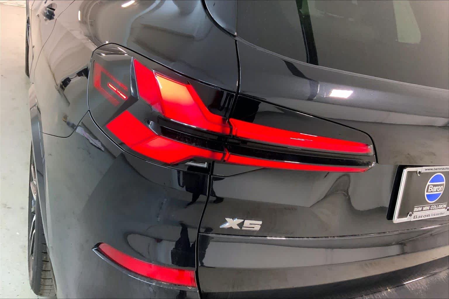 New 2026 Black Sapphire Metallic BMW M60i image 14