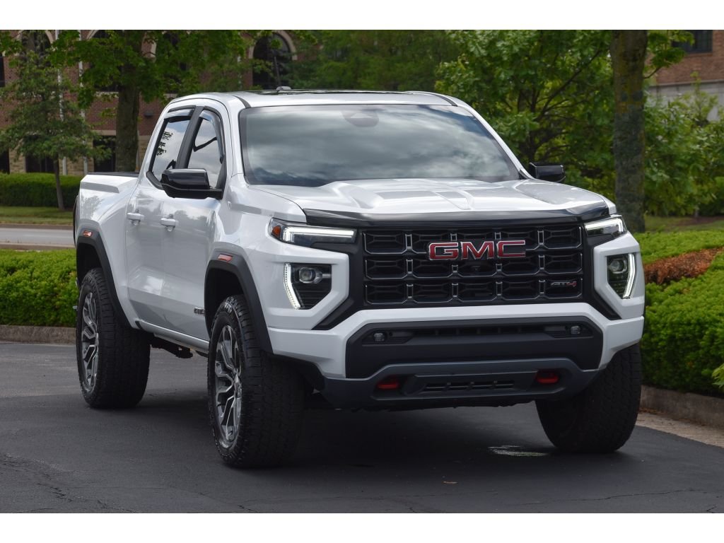 Used 2024 Summit White GMC 4WD AT4 image 2