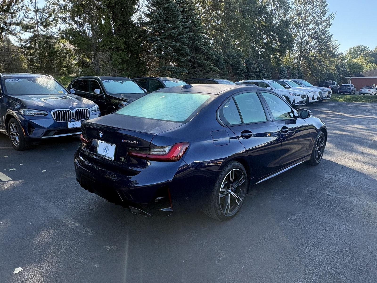 Used 2024 Tanzanite Blue II Metallic BMW M340i xDrive image 7