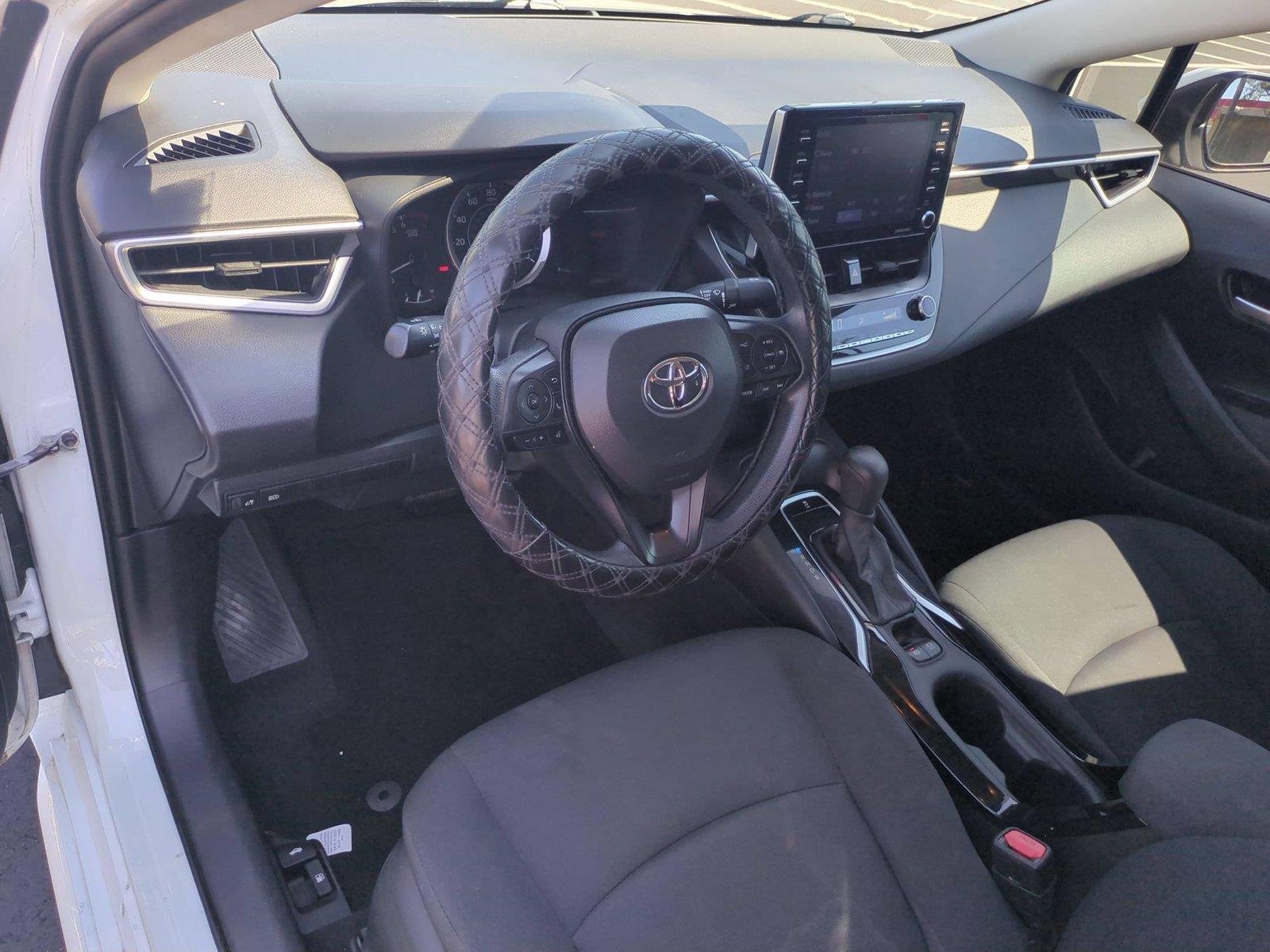 Used 2021 Super White Toyota LE image 19