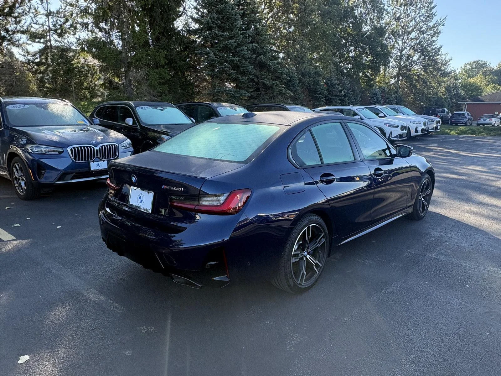 Used 2024 Tanzanite Blue II Metallic BMW M340i xDrive image 7