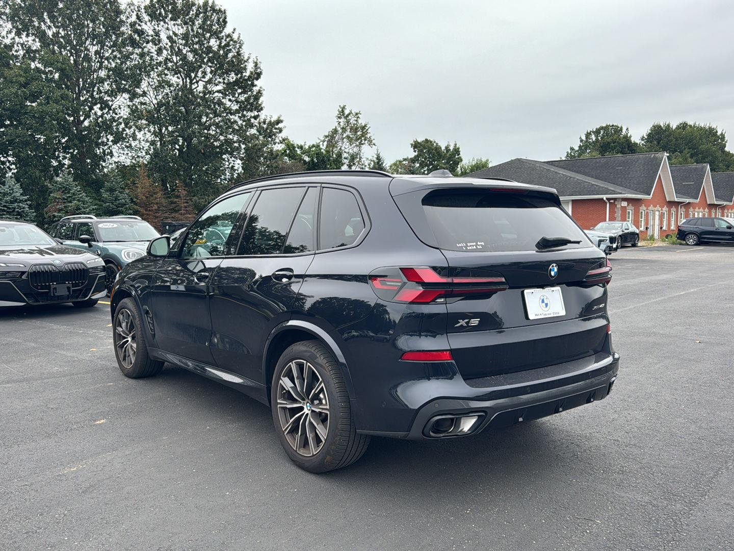 Used 2025 Carbon Black Metallic BMW xDrive40i image 5
