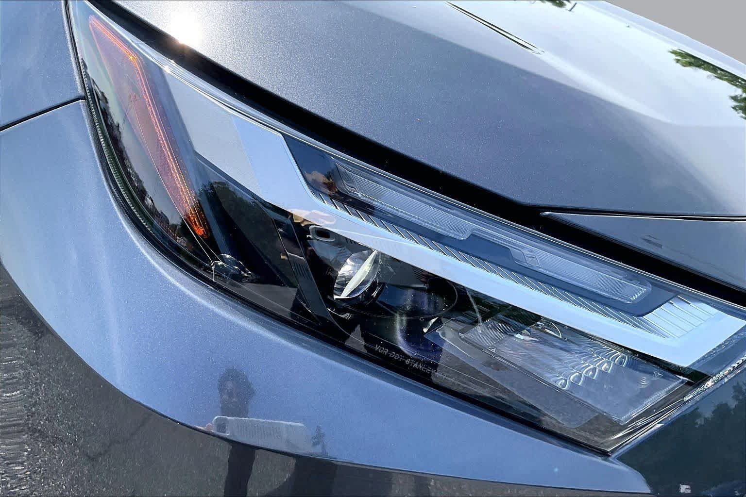 Used 2024 Magnetic Gray Metallic Toyota Hybrid XLE Premium image 28