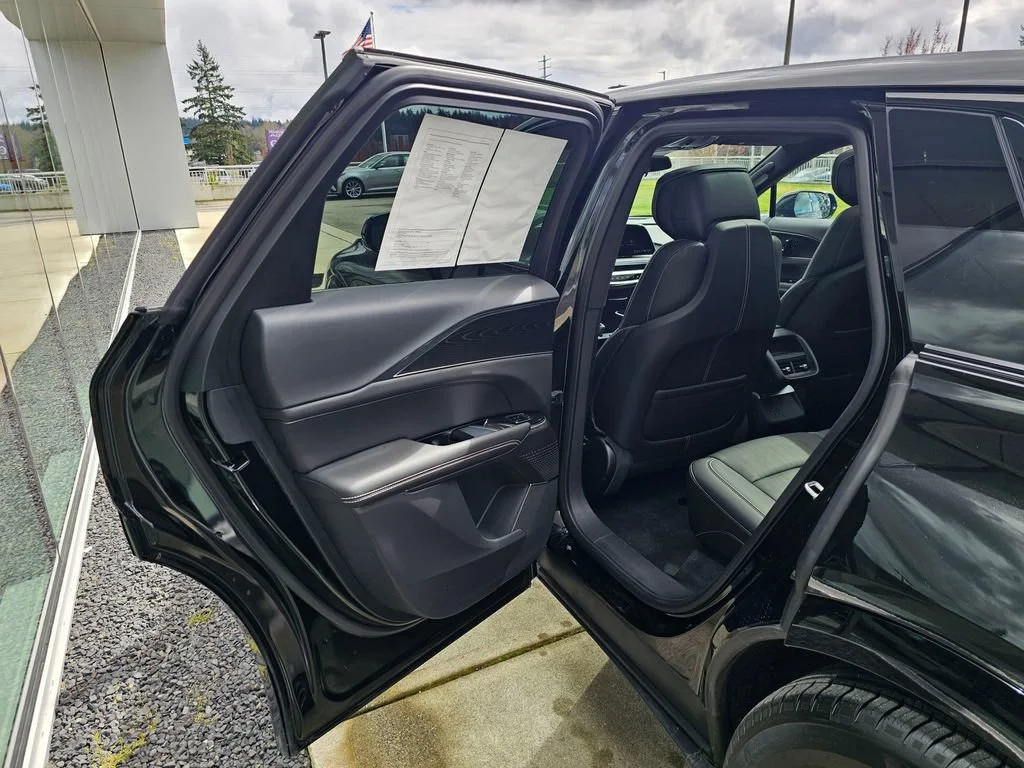 Used 2025 Stellar Black Metallic Cadillac Sport 1 image 15