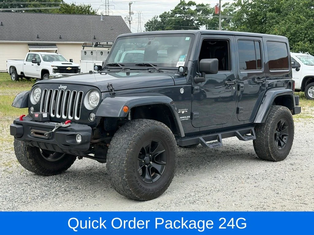 Used 2017 Black Jeep Unlimited Sahara image 10
