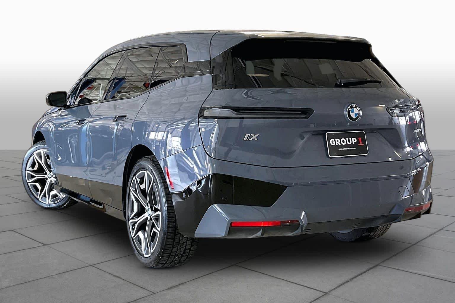 Used 2024 Storm Bay Metallic BMW xDrive50 image 11
