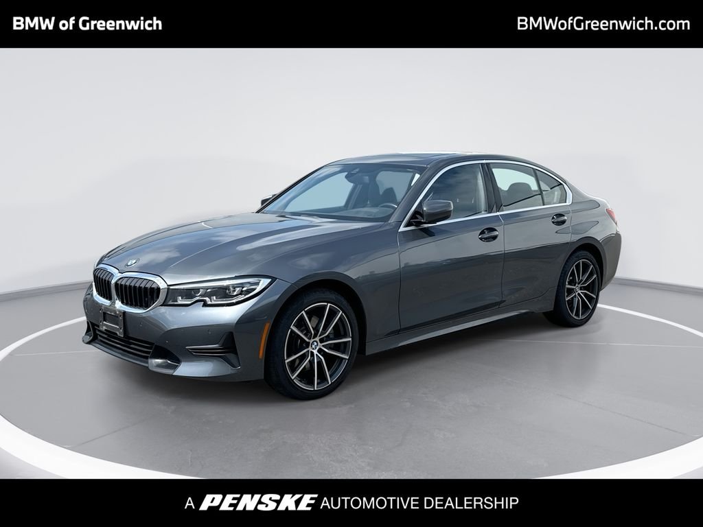 Used 2019 Mineral Gray Metallic BMW 330i xDrive image 1