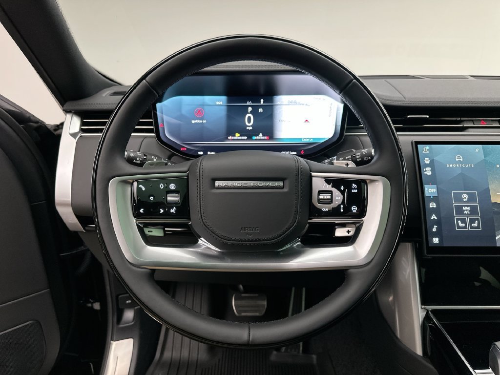 New 2027 Santorini Black Metallic Land Rover SE image 14