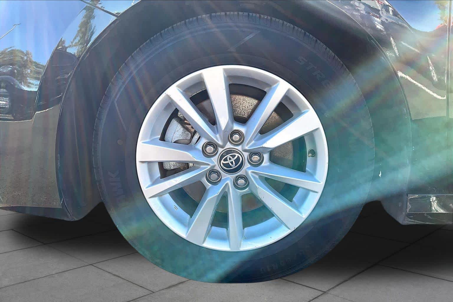 Used 2025 Midnight Black Metallic Toyota LE image 11