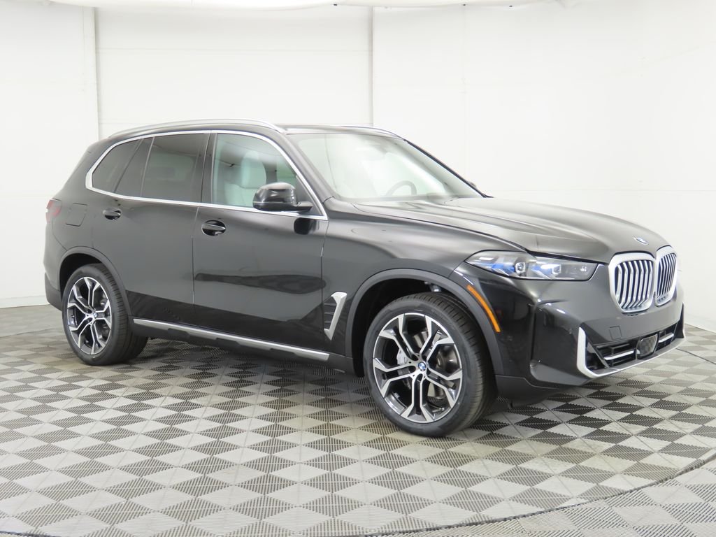 Certified Used 2026 Black Sapphire Metallic BMW sDrive40i image 4