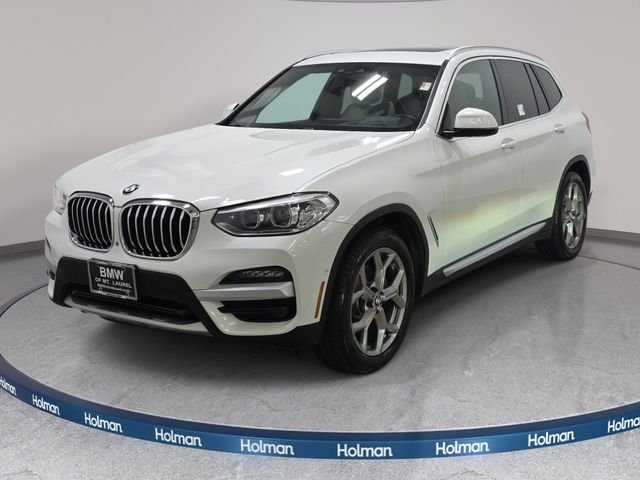 Used 2021 Mineral White Metallic BMW xDrive30i image 1