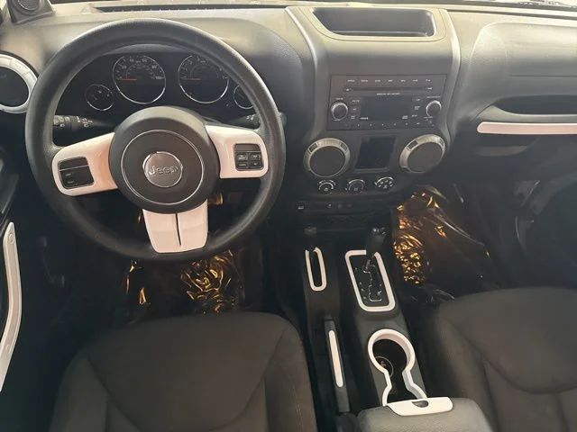 Used 2014 Silver Jeep Unlimited Sport image 24