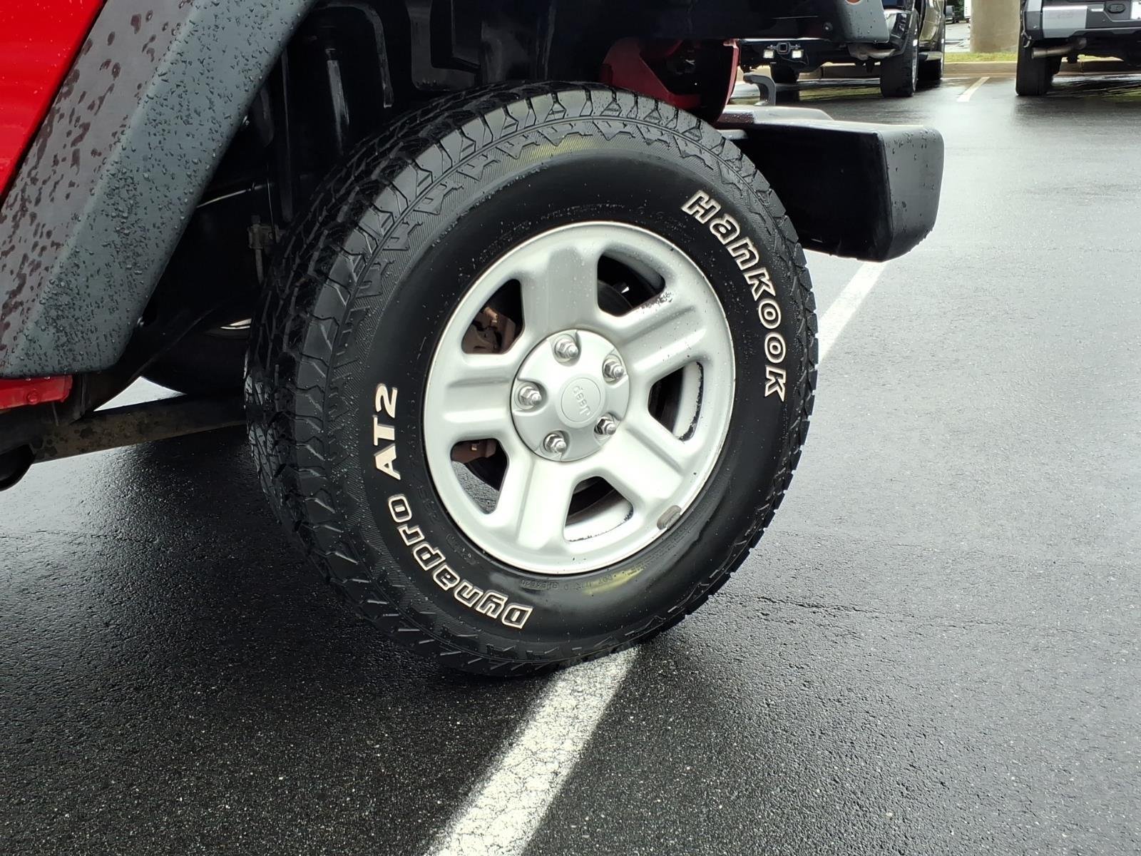 Used 2013 Flame Red Clearcoat Jeep Sport image 11