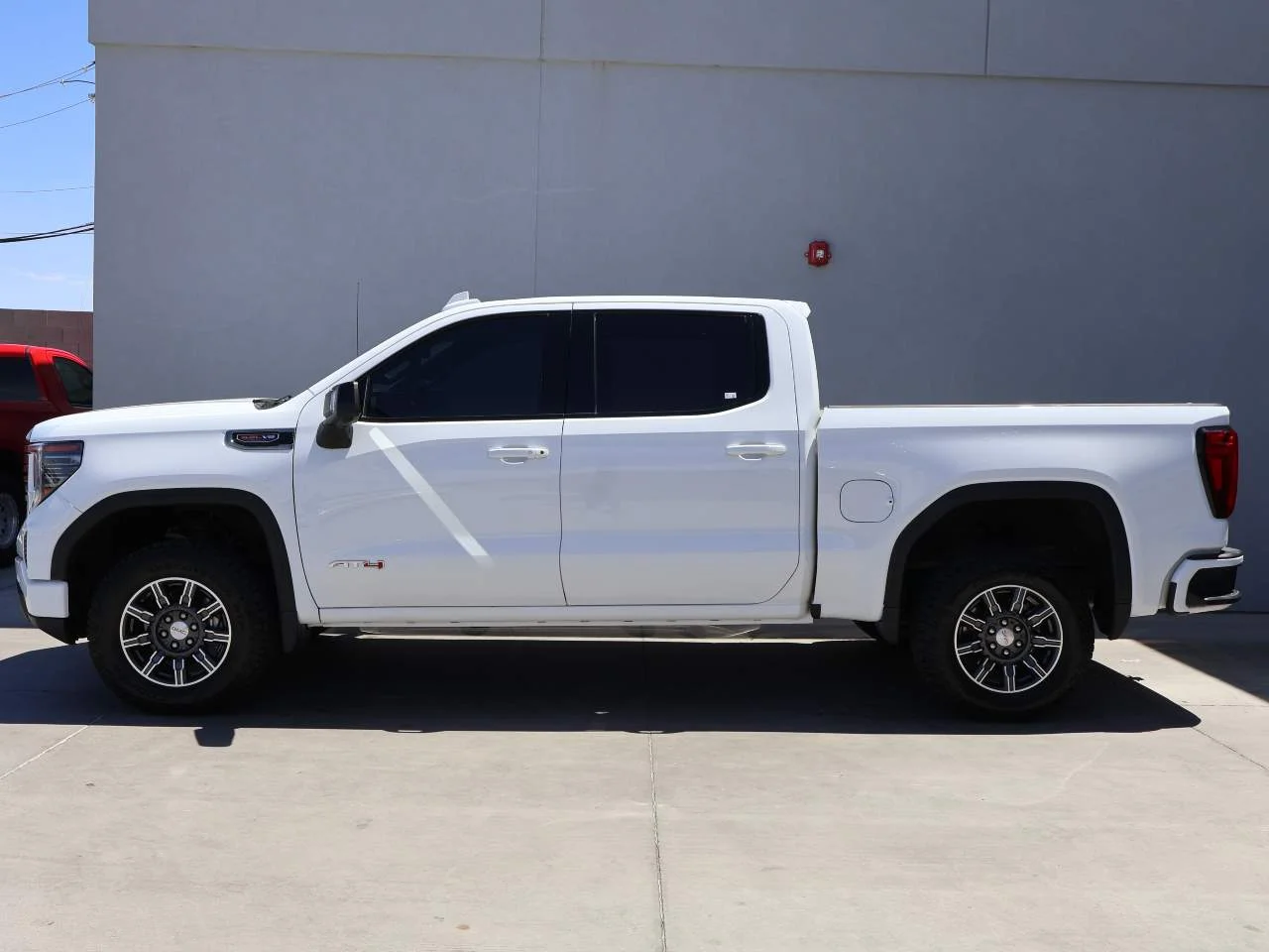 Used 2025 Summit White GMC AT4 Crew Cab image 2