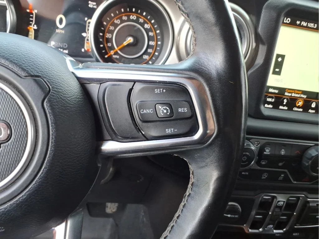 Used 2018 Orange Jeep Unlimited Sahara image 20