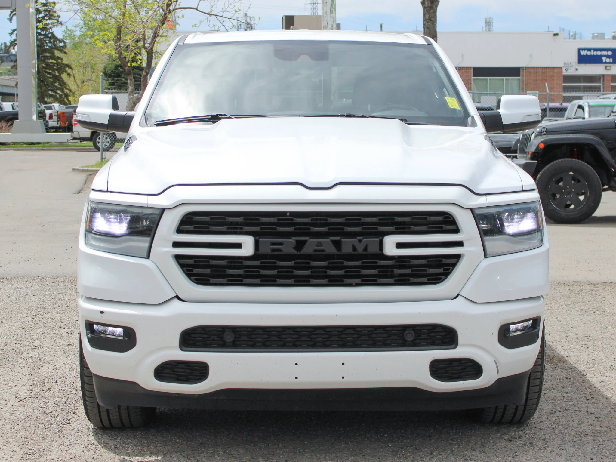 Certified Used 2022 White RAM Sport * HEMI V8 | Cold Air Intake | Heated Seats | Navigation | Bed Utility Group | Apple CarPlay image 9