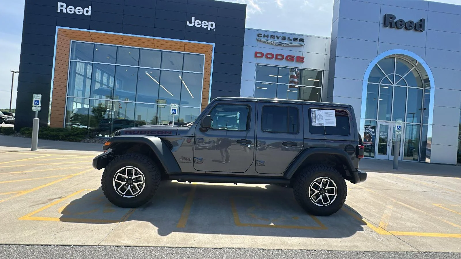 Used 2025 Jeep Wrangler 4-Door Rubicon with VIN 1C4PJXFN8SW606427 for sale in Kansas City