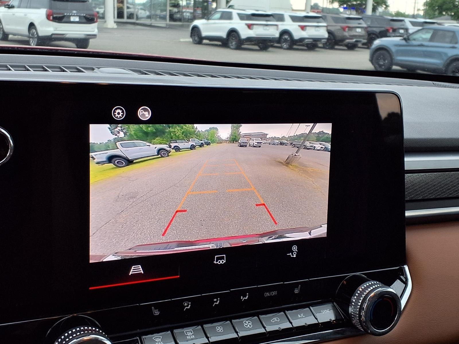 Used 2025 Volcanic Red Tintcoat GMC 4WD AT4 image 4