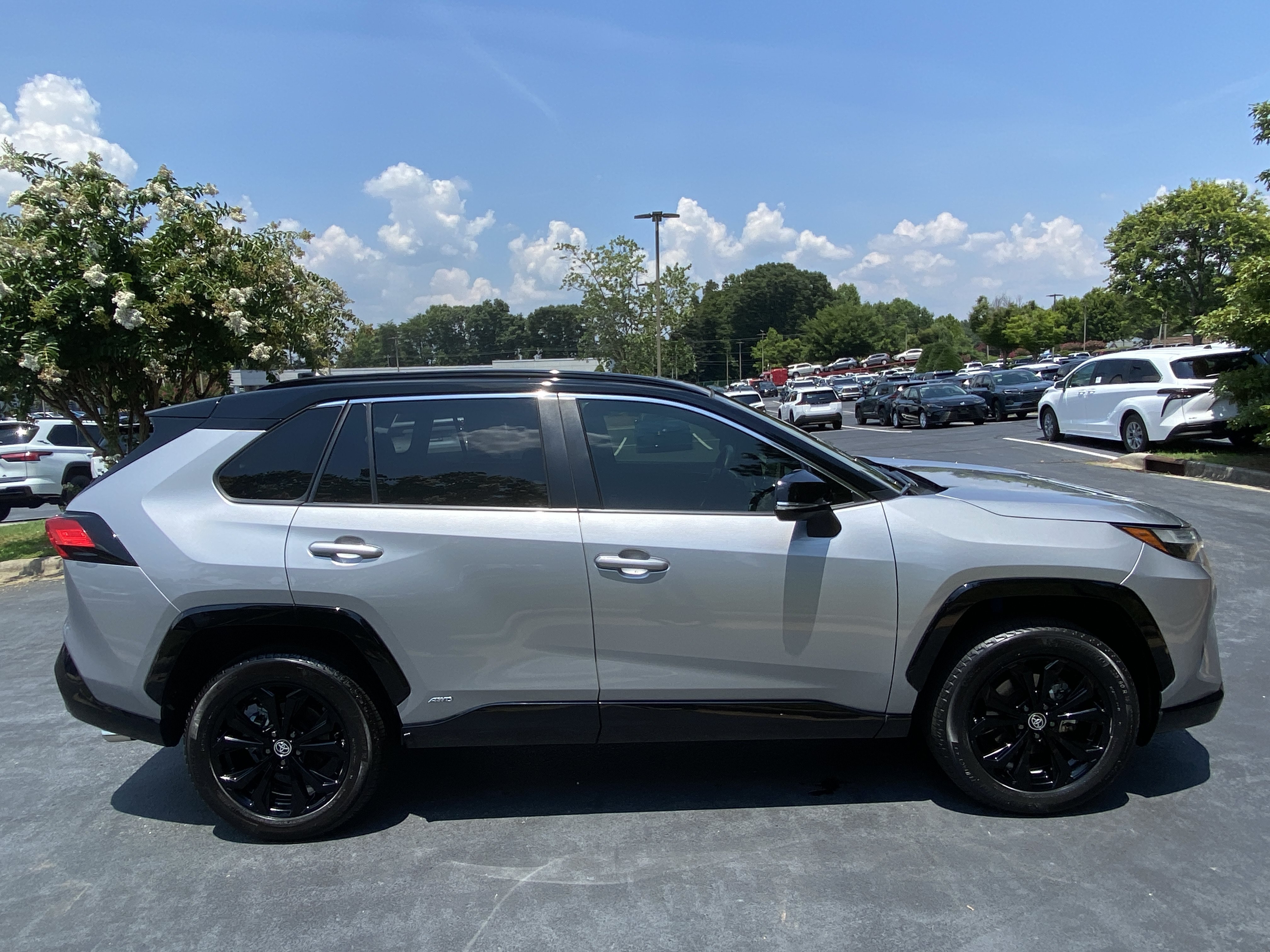 Used 2022 Silver Sky Metallic Toyota Hybrid XSE image 4